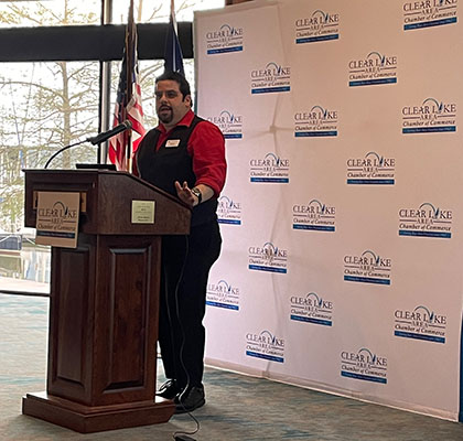 Matthew Peek, Associate Director of UHCL Archives and Special Collections, delivers presentation at the Clear Lake Area Chamber of Commerce General Membership Luncheon on March 27.
